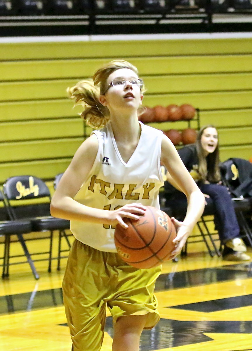 Image: Paige Cunningham(1) drives the length of the court to put in a layup during the Combo game (7th and 8th) as Italy coach Holly Bradley urges her on against visiting Blooming Grove.