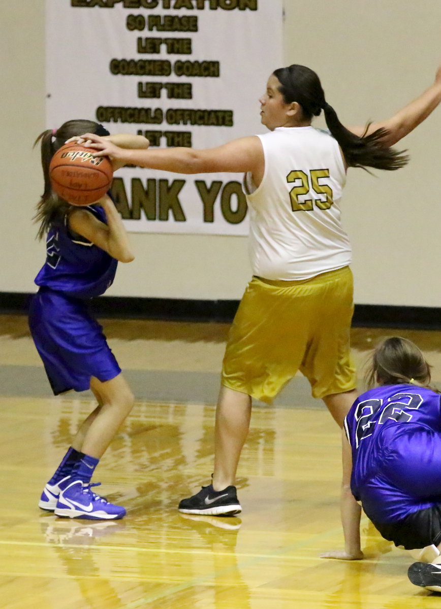 Image: Jenna Holden(25) causes a misfire for a Blooming Grove shooter.