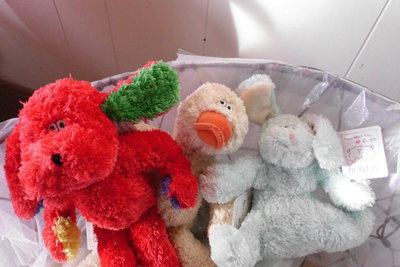 Image: A bin full of fuzzy stuffed animals.