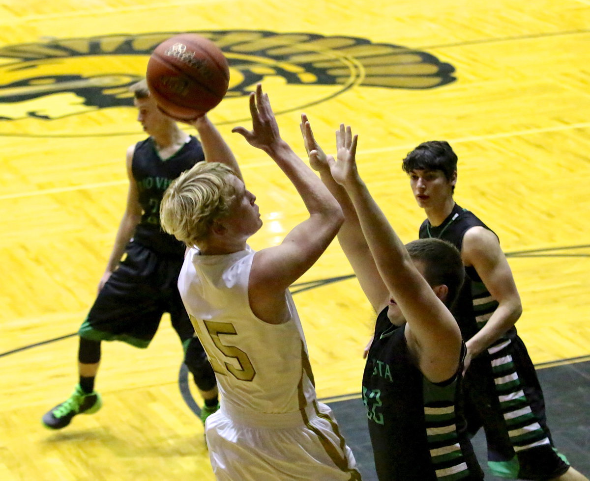 Image: Gladiator Cody Boyd(15) rises for 2-points.