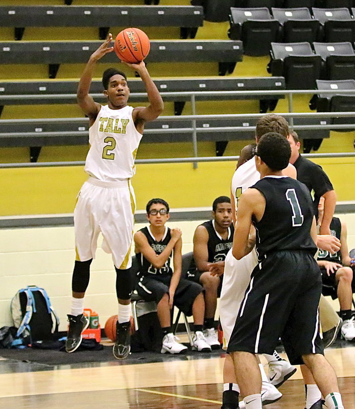 Image: Trevon Robertson(2) shoots from beyond the arc.