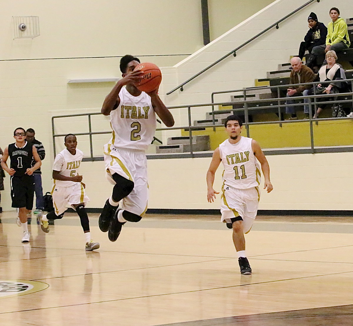 Image: Trevon Robertson(2) gets the shot off before the first-quarter buzzer sounds.