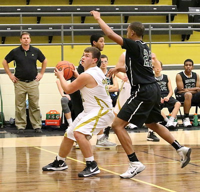 Image: Zain Byers(21) gets a pass into the low block and then makes a move.