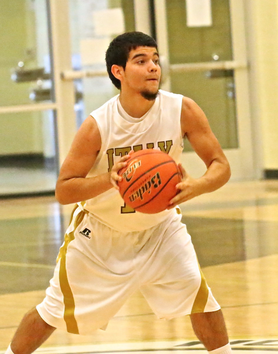 Image: Senior point guard Tyler Anderson(11) runs the show for the Gladiators.