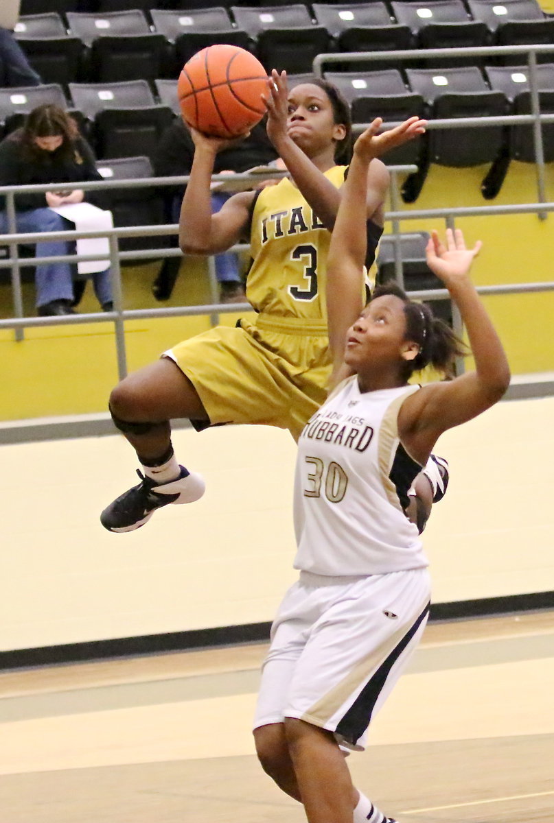 Image: Kortnei Johnson(3) does what she does best, score to finish off Italy’s fast breaks.