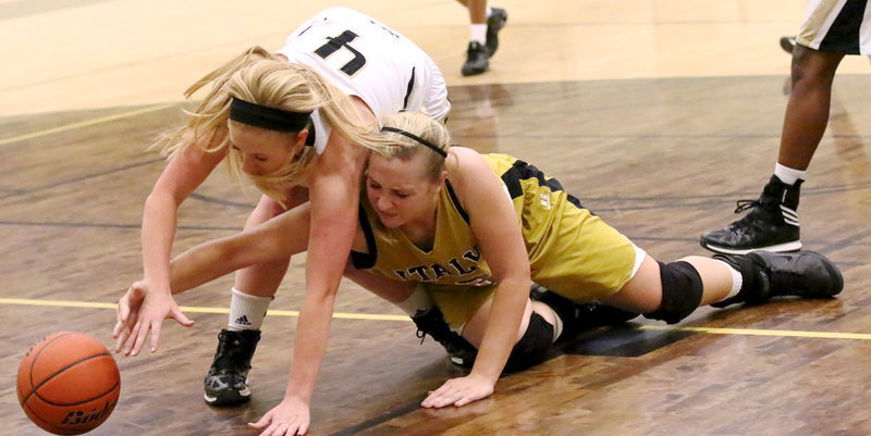 Image: Italy’s Jaclynn Lewis(13) duels for the loose ball.