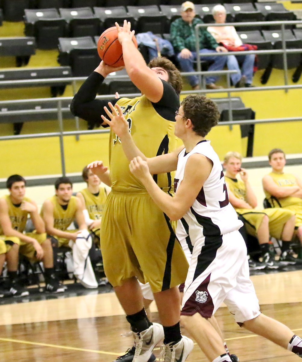 Image: Kevin Roldan(33) goes up for a shot.