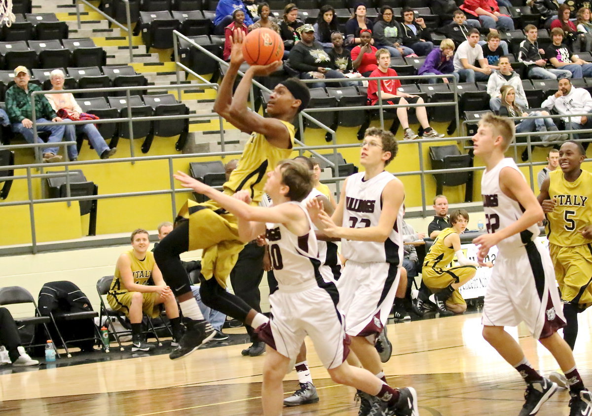 Image: Finishing the fast break is Trevon Robertson(2).