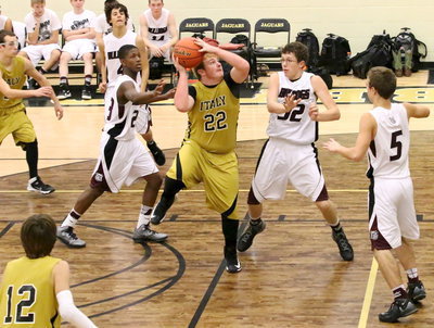 Image: Tyler “Diesel” Vencill(22) wheels and deals for 2-points in the lane. Vencill finished with a season high 7-points.