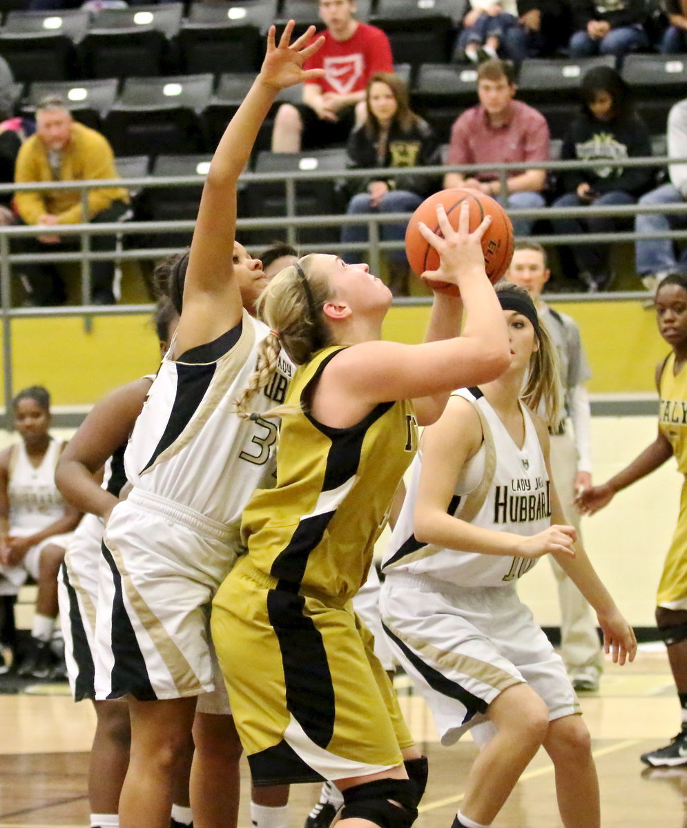 Image: Jaclynn Lewis(13) pump fakes a defender.