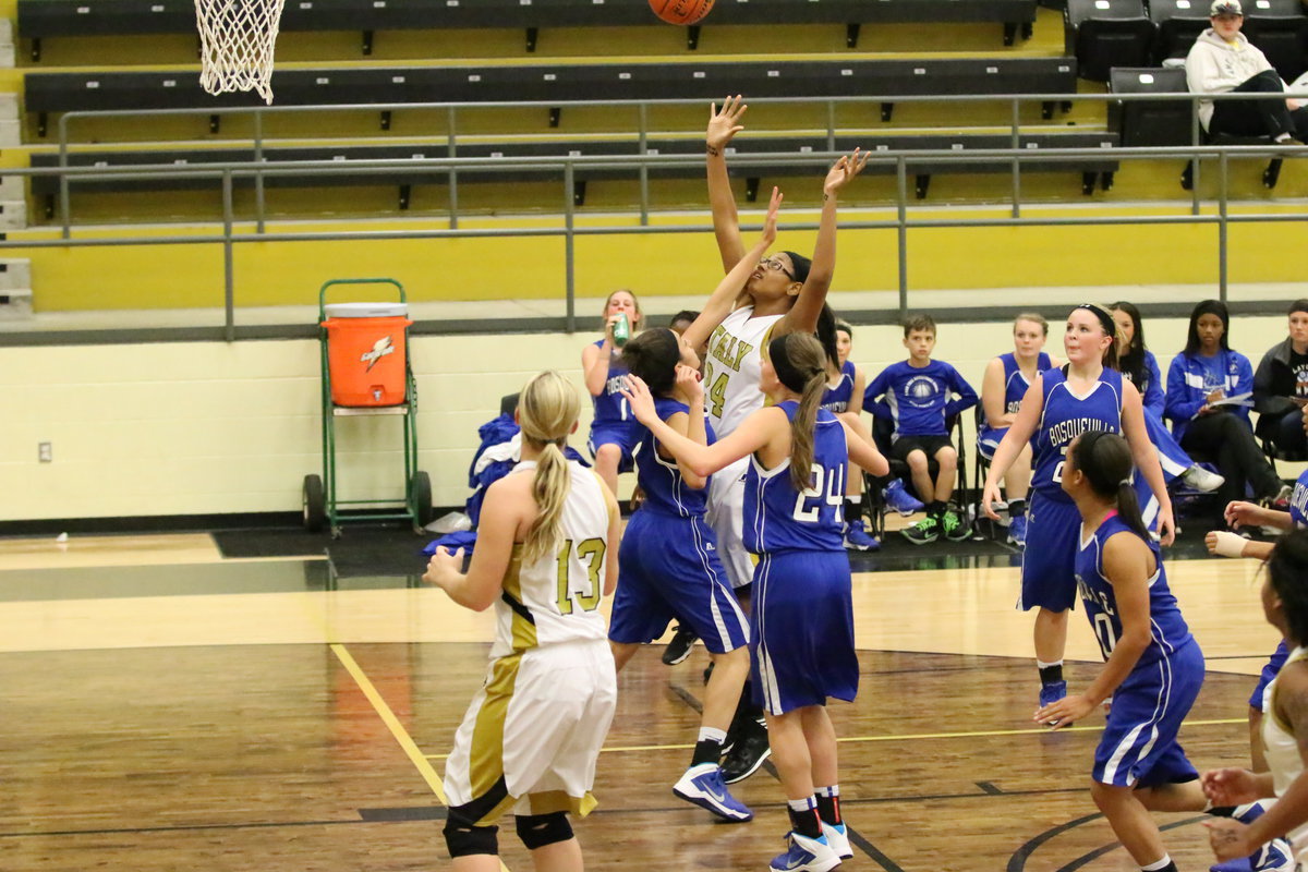 Image: Oleshia Anderson(24) earns a trip to the line where she splits a pair of free-throws.