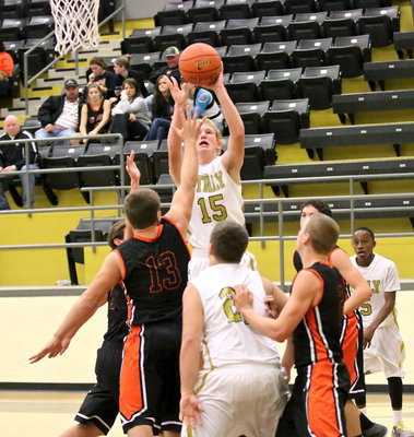 Image: Cody Boyd(15) rises for a basket.