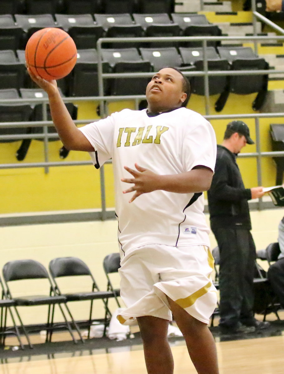 Image: Darol Mayberry warms up during the pre-game.