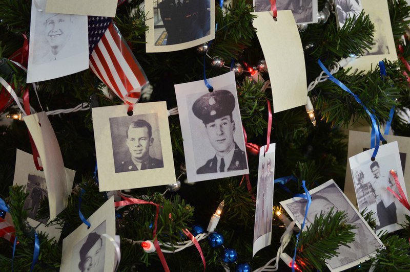Image: Christmas tree adorned with photos of Veterans