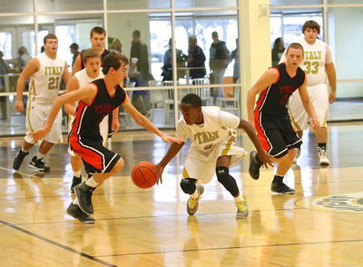 Image: Bailey Walton(14) helps create a steal for Kevin Johnson(5).
