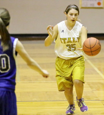 Image: Cassidy Gage(35) pushes the ball up the floor.