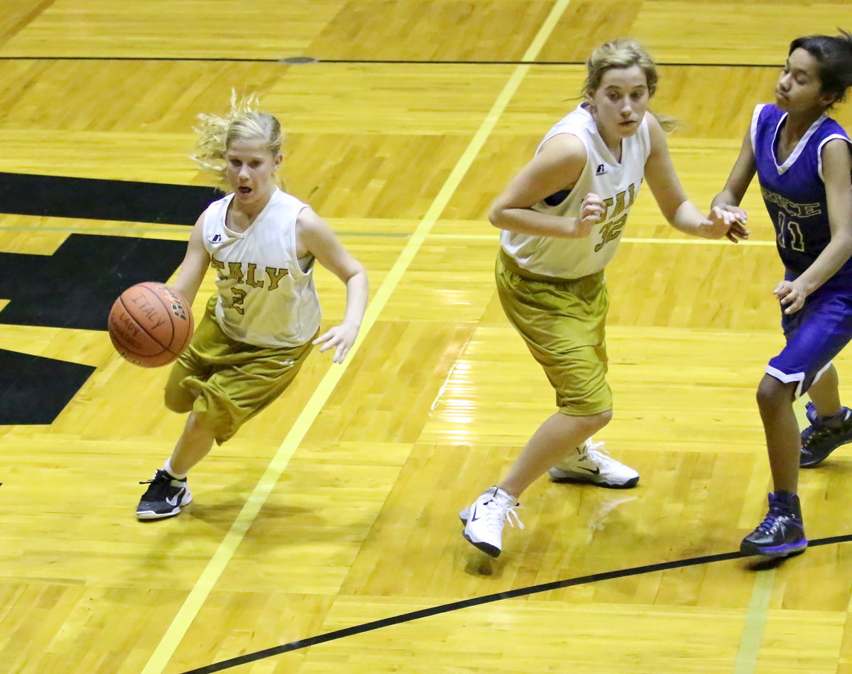 Image: Hannah Haight(32) sets a screen for teammate Karson Holley.