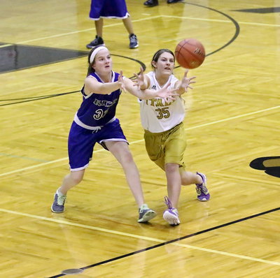 Image: Cassidy Gage(35) steals the pass away from Venus.