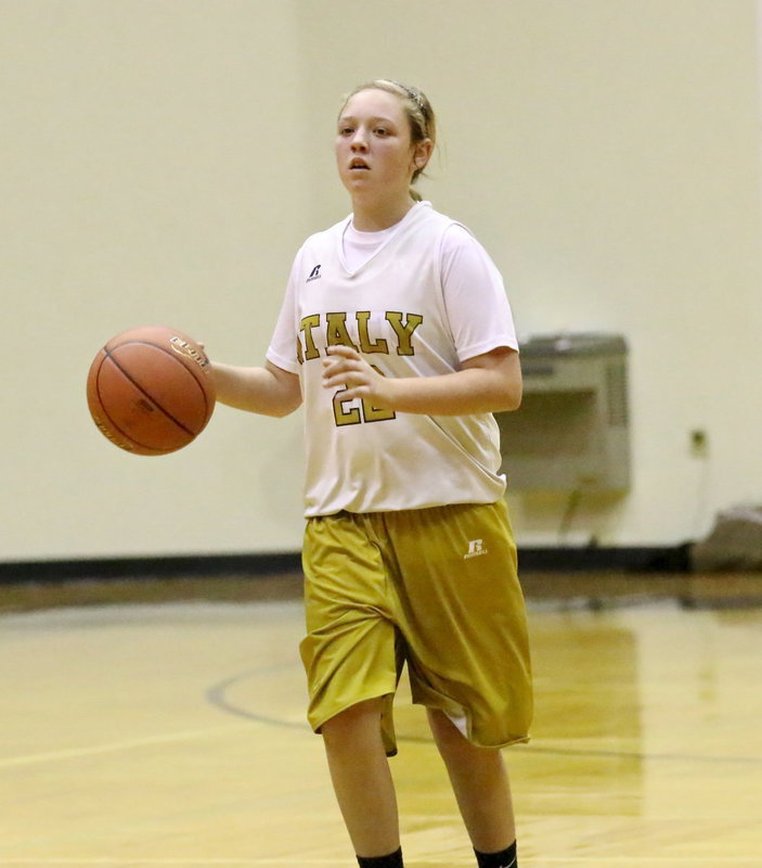 Image: Point guard Brycelyn Richards(22) brings the ball up court to start the offense for Italy’s 8th grade girls.