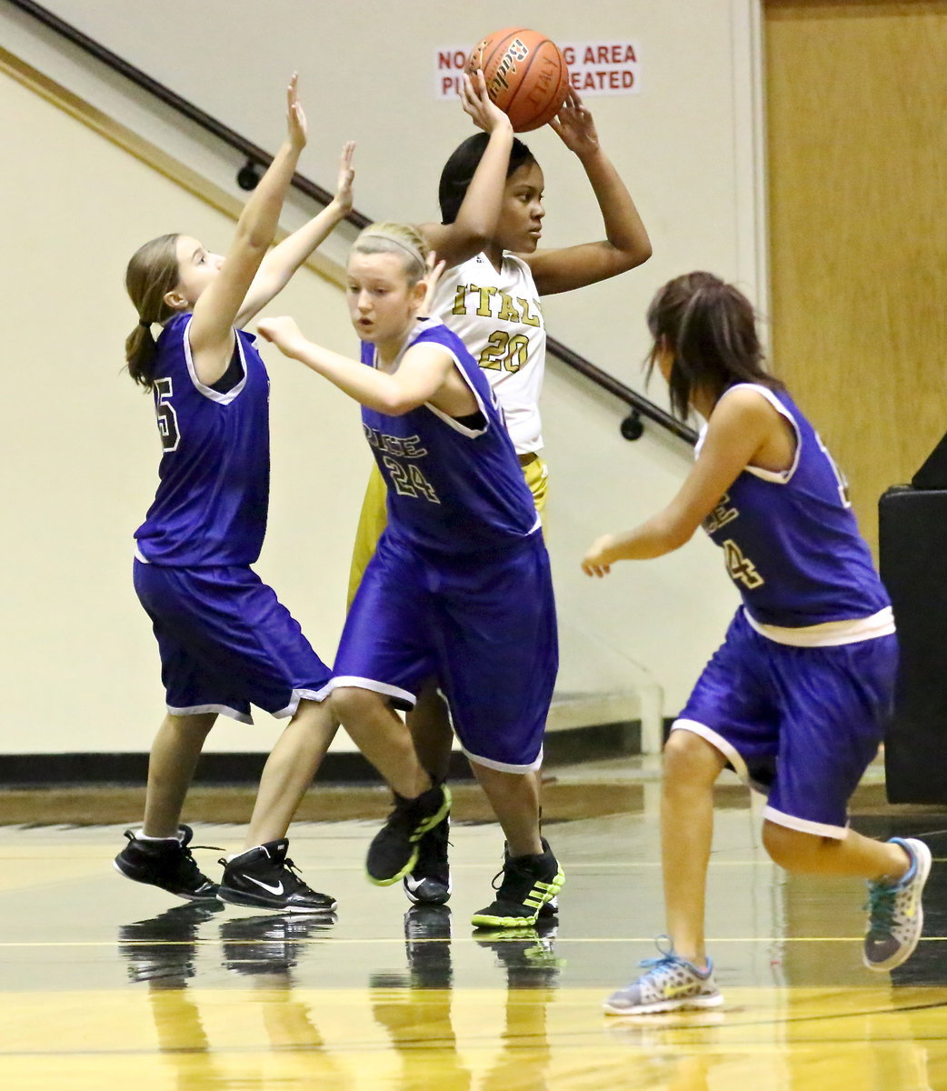 Image: Charisma Anderson(20) grabs a defensive board.