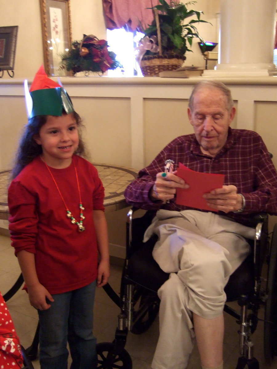 Image: This resident is having fun reading his card.