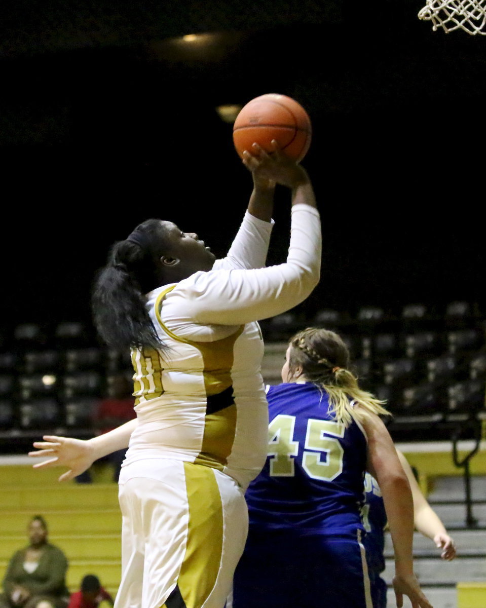 Image: Cory Chance(40) rises above a Venus defender for the score. Chance finished with 9-points against Venus.