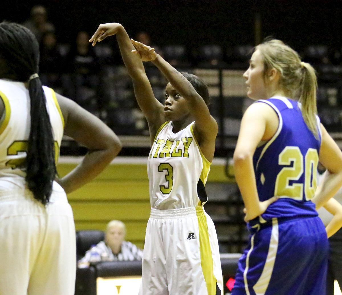 Image: Kortnei Johnson(3) drops in another point for the Lady Gladiators. Johnson went 4-of-6 from the line and finished with 30-points against Venus.