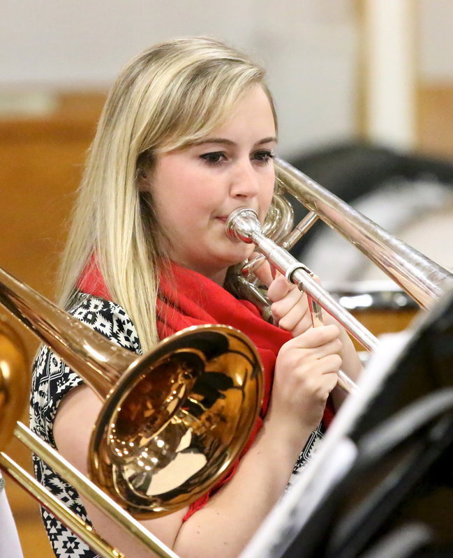 Image: Kelsey Nelson chimes in with the trombone section.