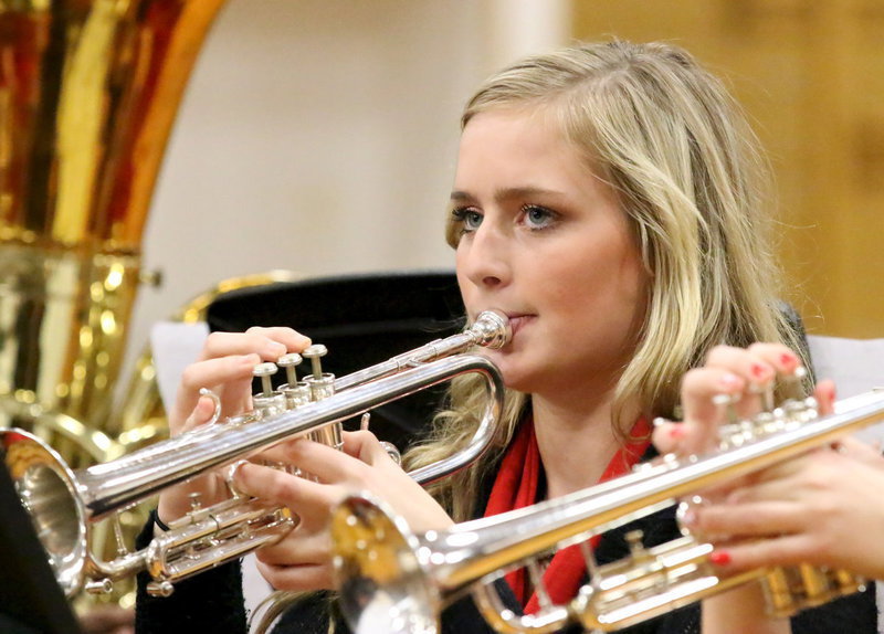 Image: Madison Washington helps bring in the holidays with her trumpet.