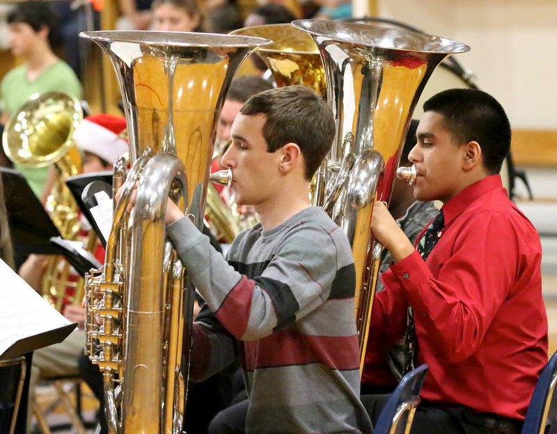 Image: Ryan Connor and David De La Hoya play tubas during the high school band’s portion of the concert.