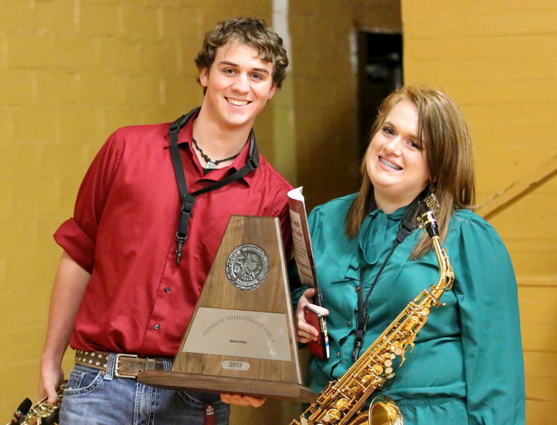 Image: Proud seniors JoeMack Pitts and Emily Stiles are all smiles after the concert. These two helped guide the 2013 Gladiator Regiment Band to the Area finals, the farthest any Italy band has ever lasted in competition.