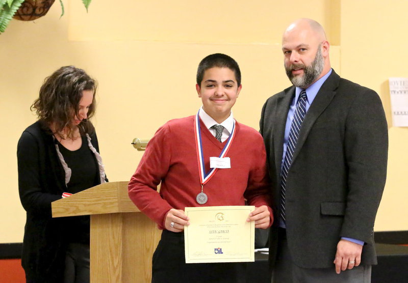 Image: Isaac Garcia earned 2nd place in the UIL’s 7th Grade Listening category. Garcia poses with Italy High School Principal Lee Joffre.