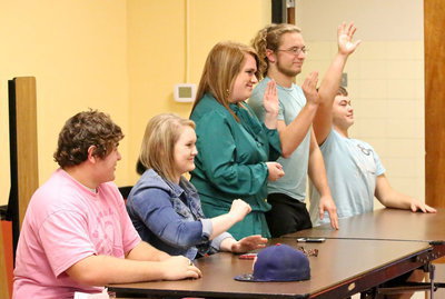 Image: Seniors on hand to support one another and represent their senior classmates on recent academic accomplishments are Kevin Roldan, Jesica Wilkins, Emily Stiles, Shad Newman and Zain Byers as they all wave to the board.