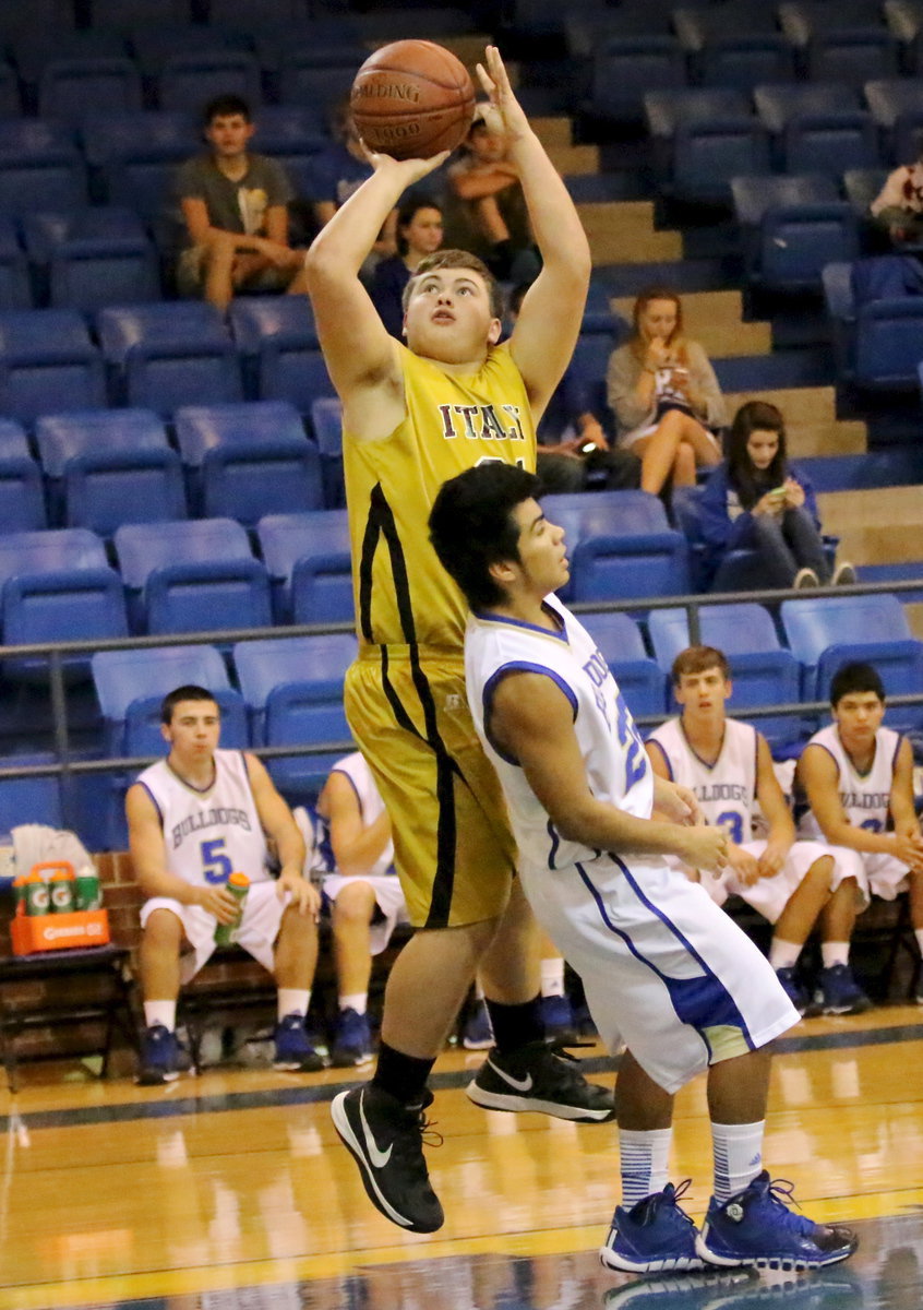 Image: Zain Byers(21) steals the ball, jump stops and then avoids a Venus defender for 2-points.