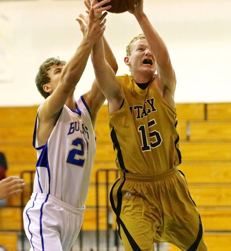 Image: Stealing away the rebound is Cody Boyd(15) after a free-throw miss by Italy.