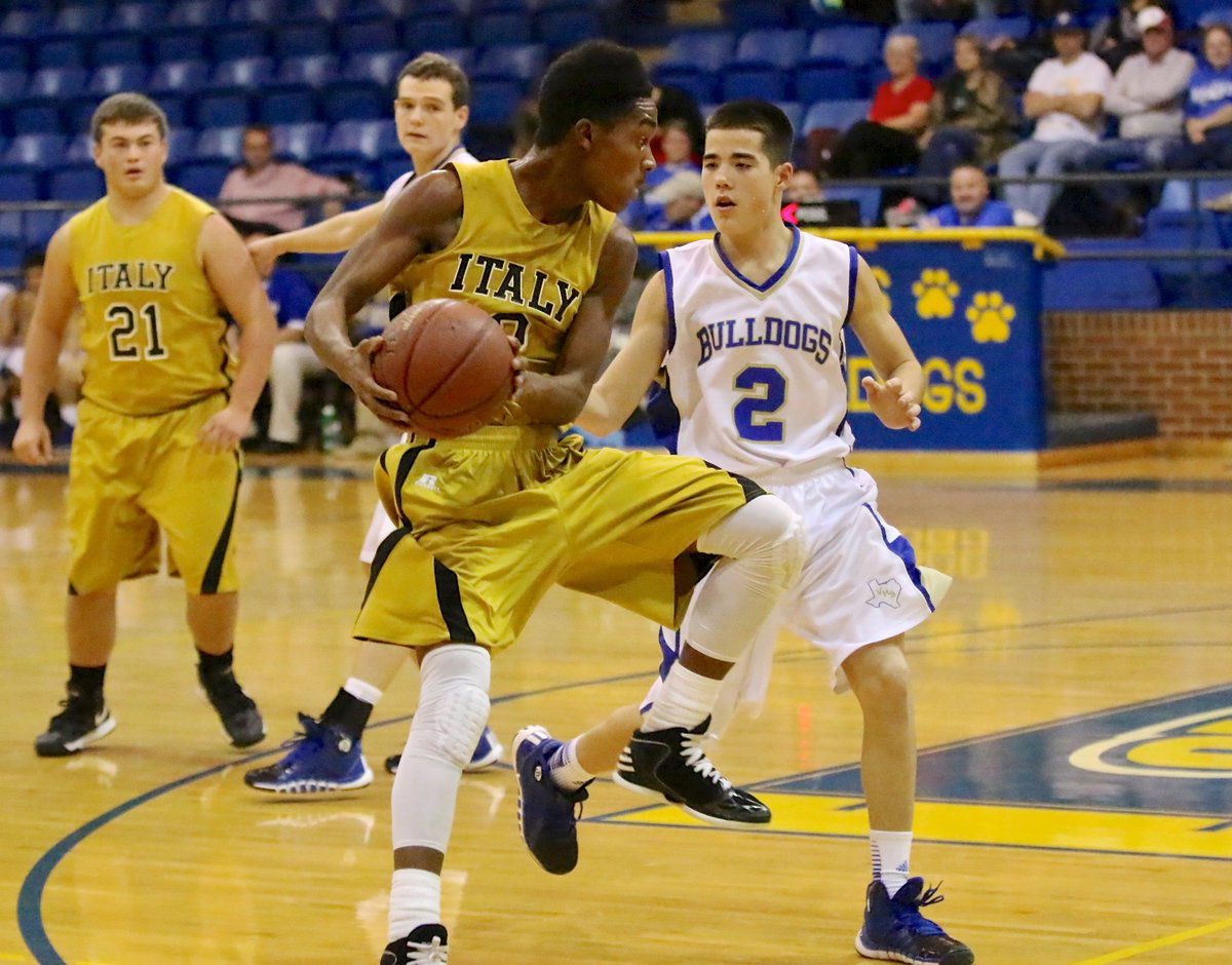 Image: Tre Robertson(2) pulls in a pass and then looks for an opening.