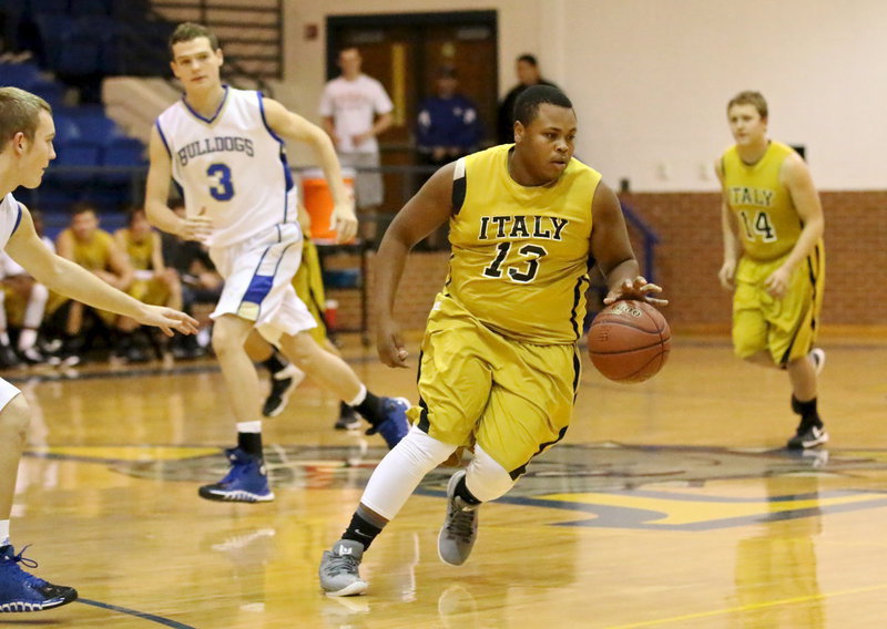 Image: Darol Mayberry(13) pulls the ball out to set up the Gladiator half-court offense.