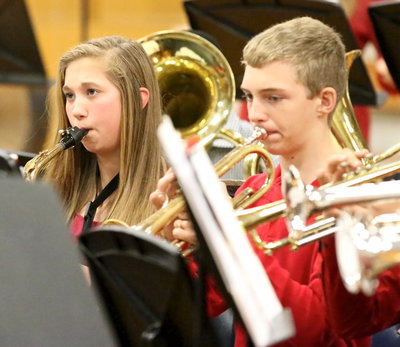 Image: Gladiator Regiment Band members help fill the old gym and their entire community with Christmas spirit.