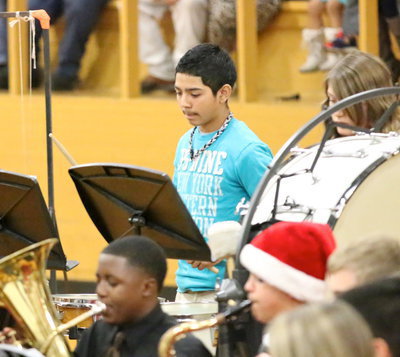 Image: Marcos Duarte drums away during the Christmas concert.