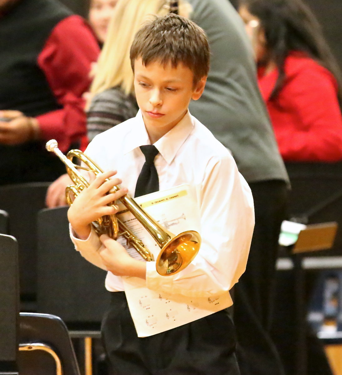 Image: The 6th graders wrap up their Christmas concert performance.