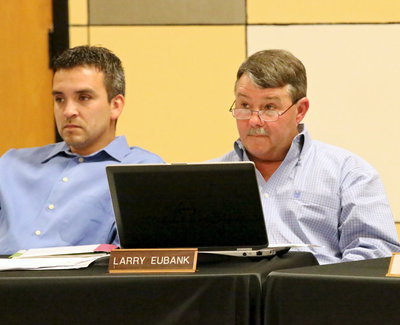Image: Board members Sal Ramirez and Larry Eubank listen intently to the maintenance report.