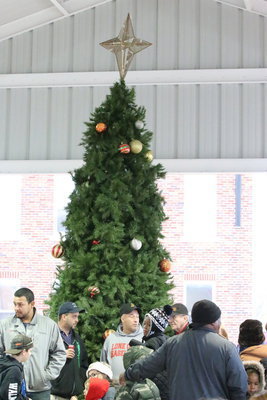 Image: The Christmas tree under the downtown pavilion roof served as a beacon to the festival crowd.