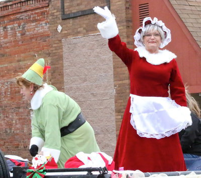 Image: Mrs. Claus gets help from her favorite elf with the Reeves Family going all out for the holidays.