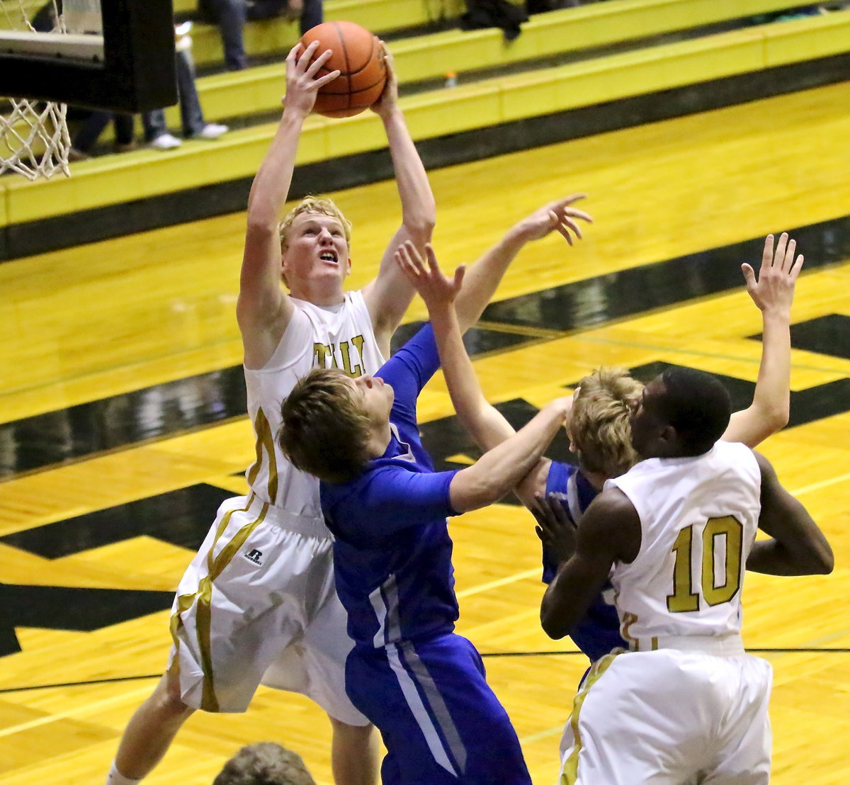 Image: Italy’s Cody Boyd(15) rips down a rebound but its Blooming Grove who scratches out a win against the Gladiators, 64-63.