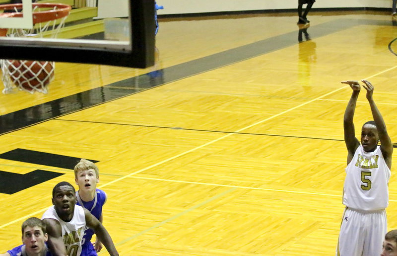 Image: Kevin Johnson(5) knocks down a free-throw.