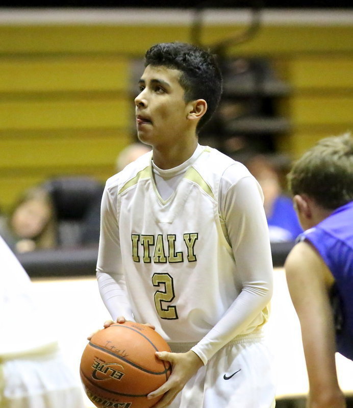 Image: Jorge Galvan(2) finishes a 3-point play the olden days way.