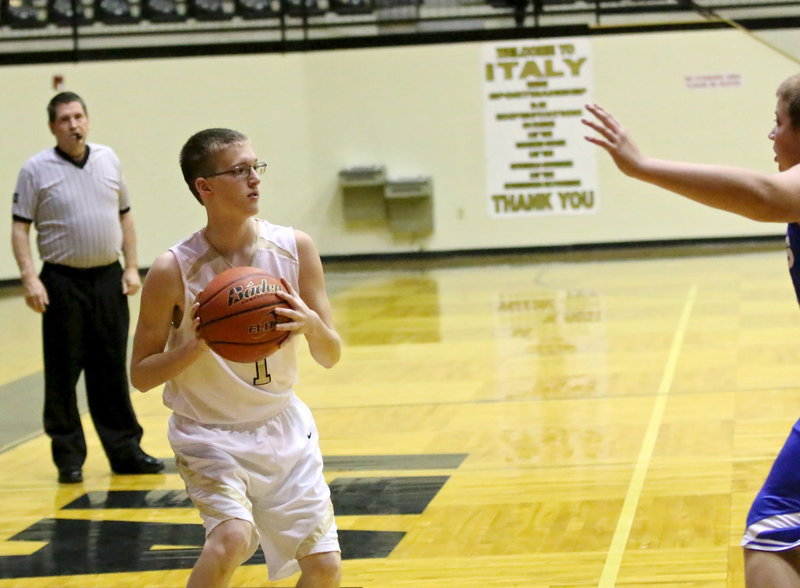 Image: Hunter Ballard(1) checks inside for an open man.