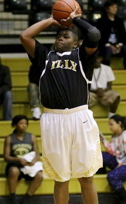 Image: JV Gladiator Kenneth Norwood(5) warms up during the pre-game before putting in 18-points against Blooming Grove.