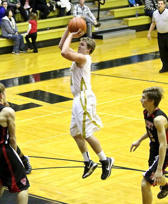 Image: Bailey Walton(14) knocks down an open jumper from the top of the lane.