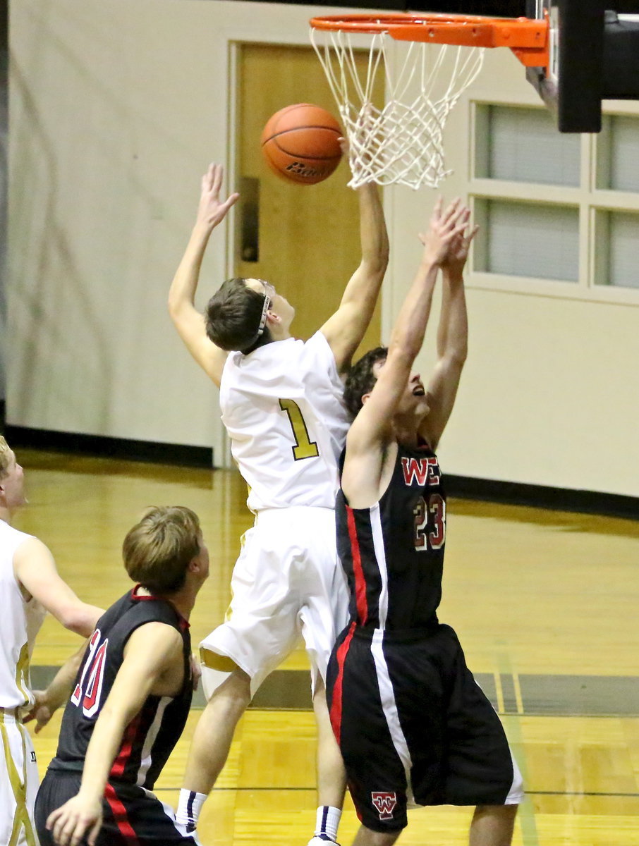 Image: Ryan Connor(1) rips down an offensive rebound for Italy.